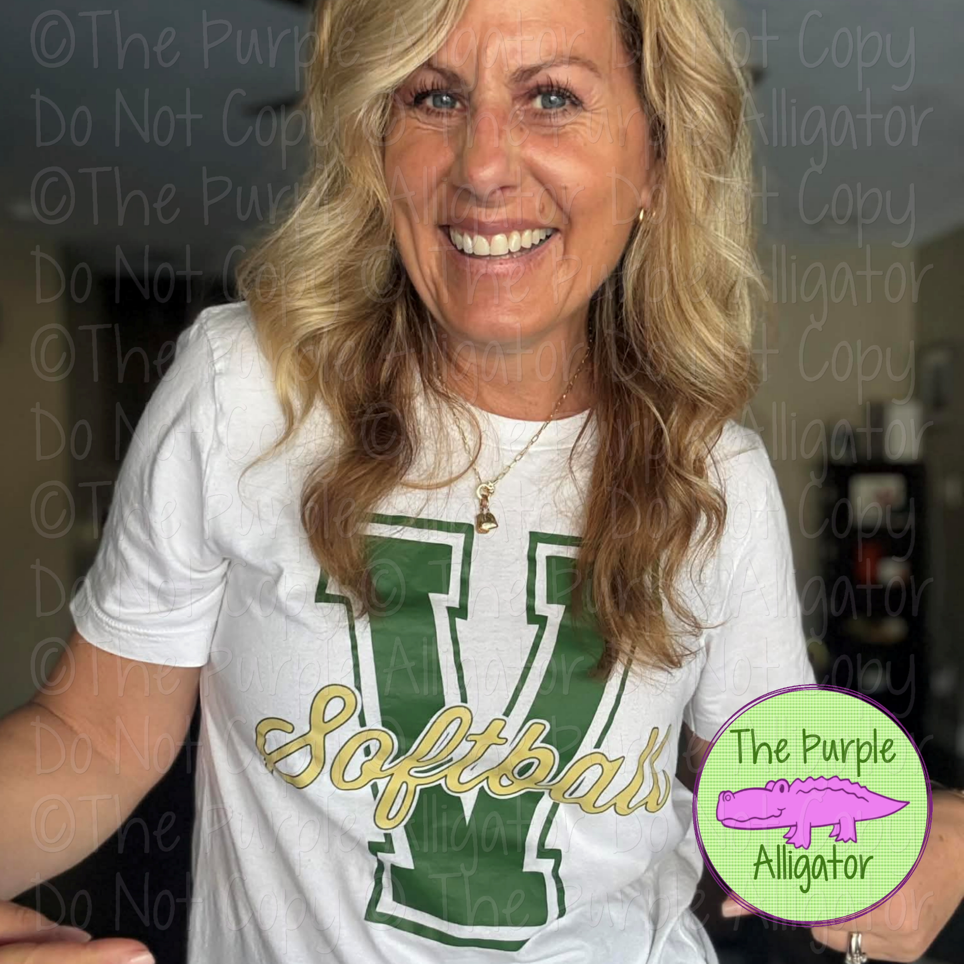 Woman wearing a white t-shirt with green and yellow text and logo, with 'The Purple Alligator' branding.
